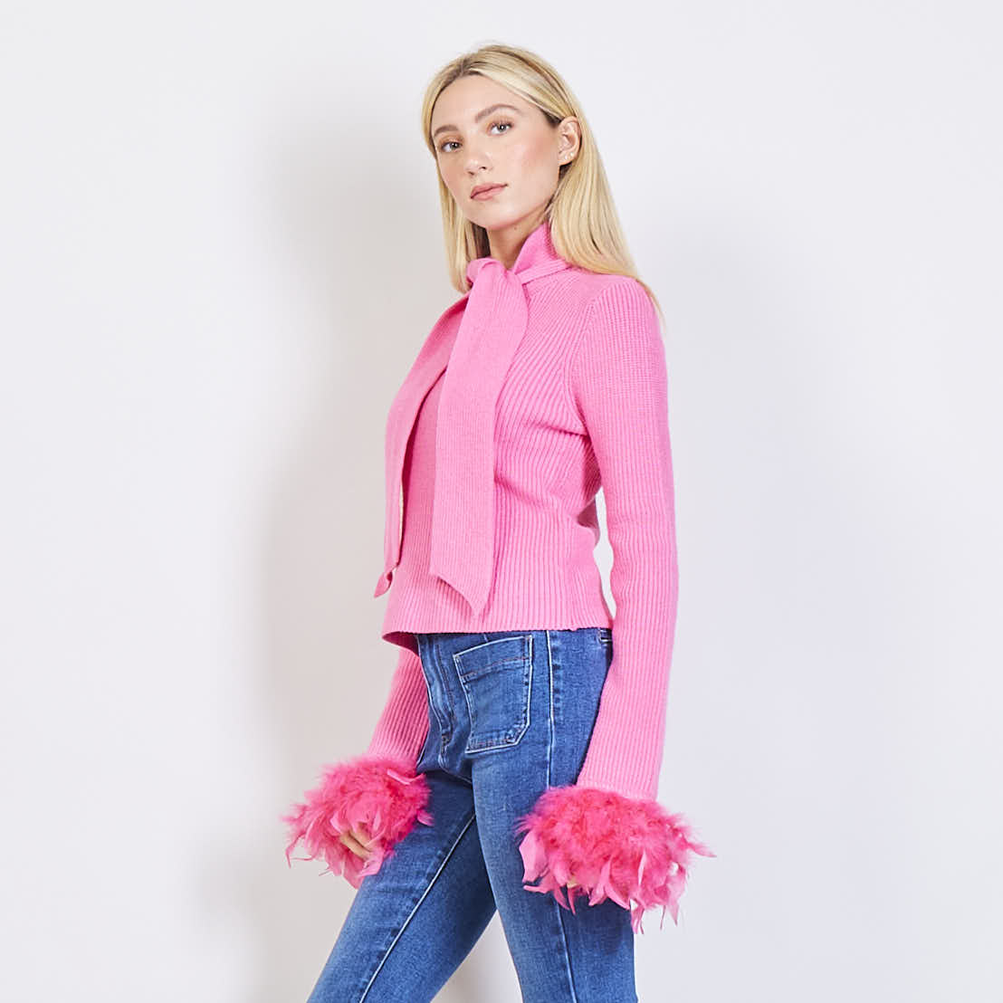 SWEATER WITH FEATHERS